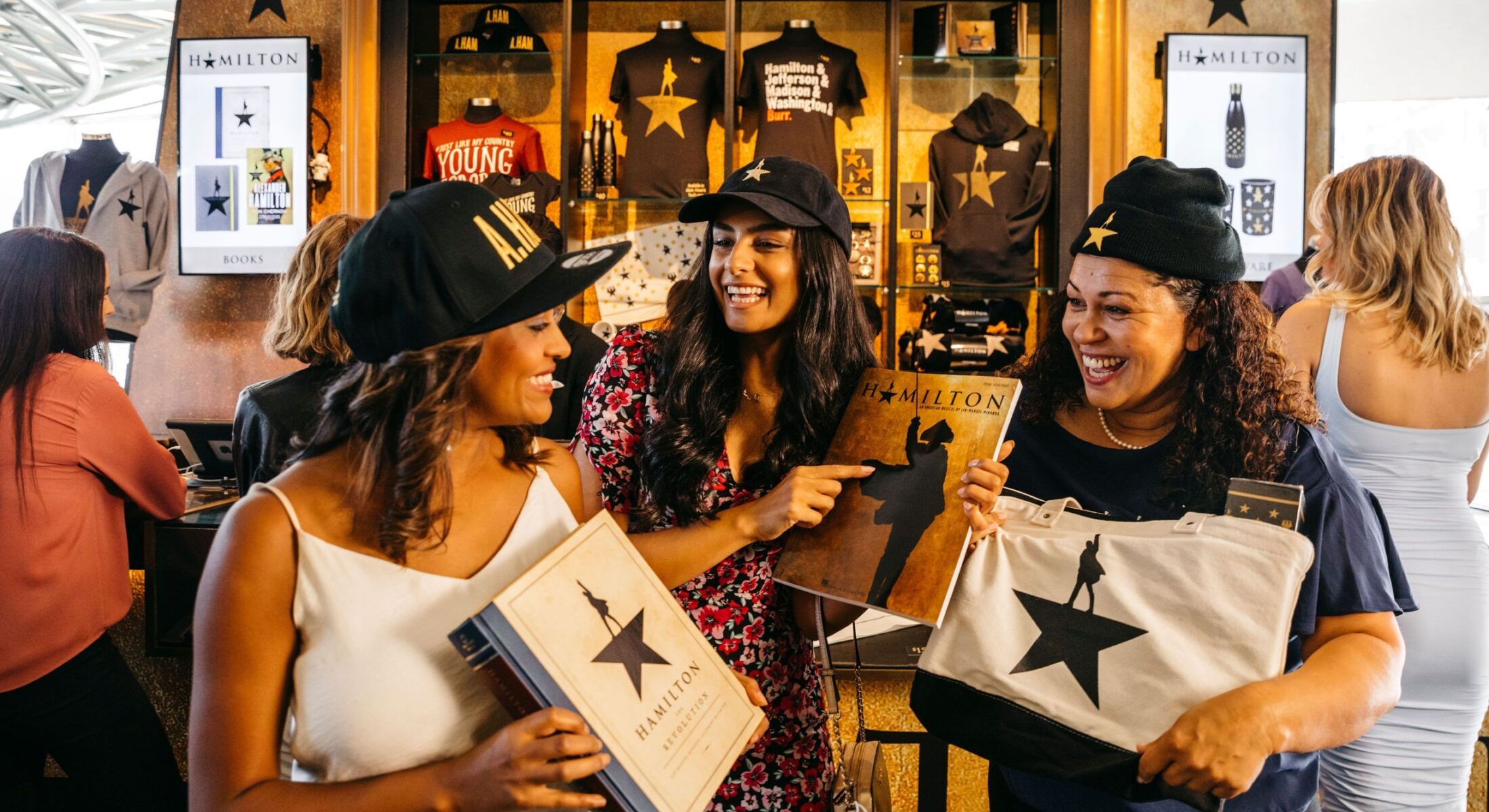 Fans of the Hamilton musical with their merchandise at the Sydney Lyric Theatre, Pyrmont.