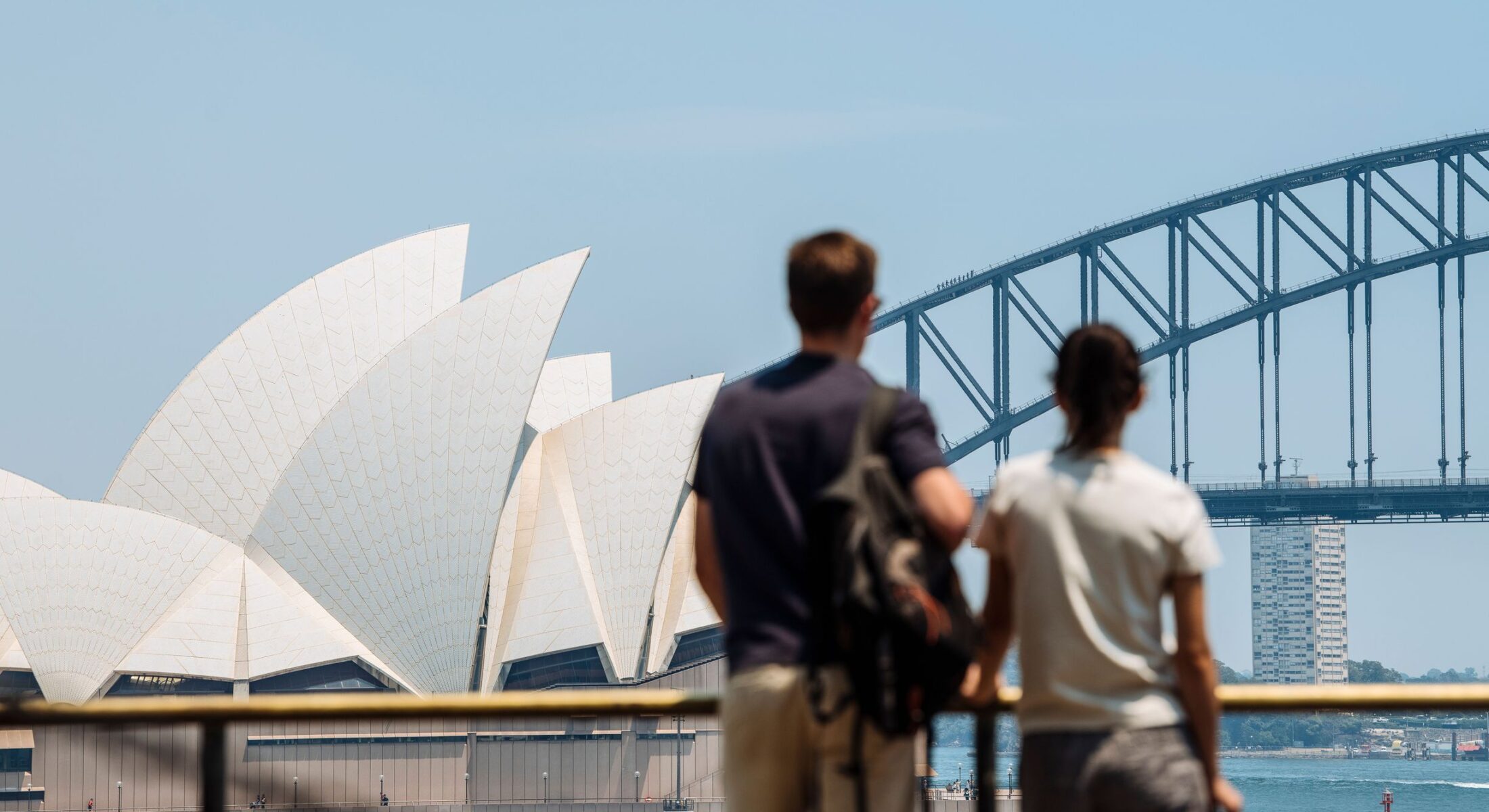 Couple enjoying scenic views of Sydney Harbour from Mrs Macquaries Point.